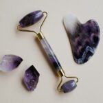 At-home beauty devices: facial rollers and a gua sha stone